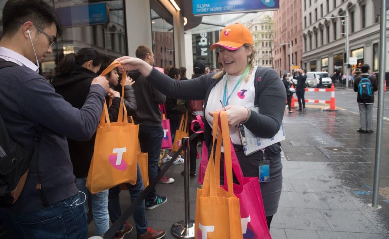 Lucky visitors receiving a goody bag